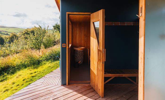 Sauna door open on our wild Welsh hillside